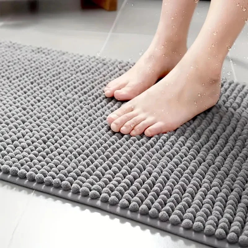 Non-slip chenille bath mat in a soft, plush texture, designed for quick-drying and superior comfort, ideal for enhancing bathroom safety and style. 3