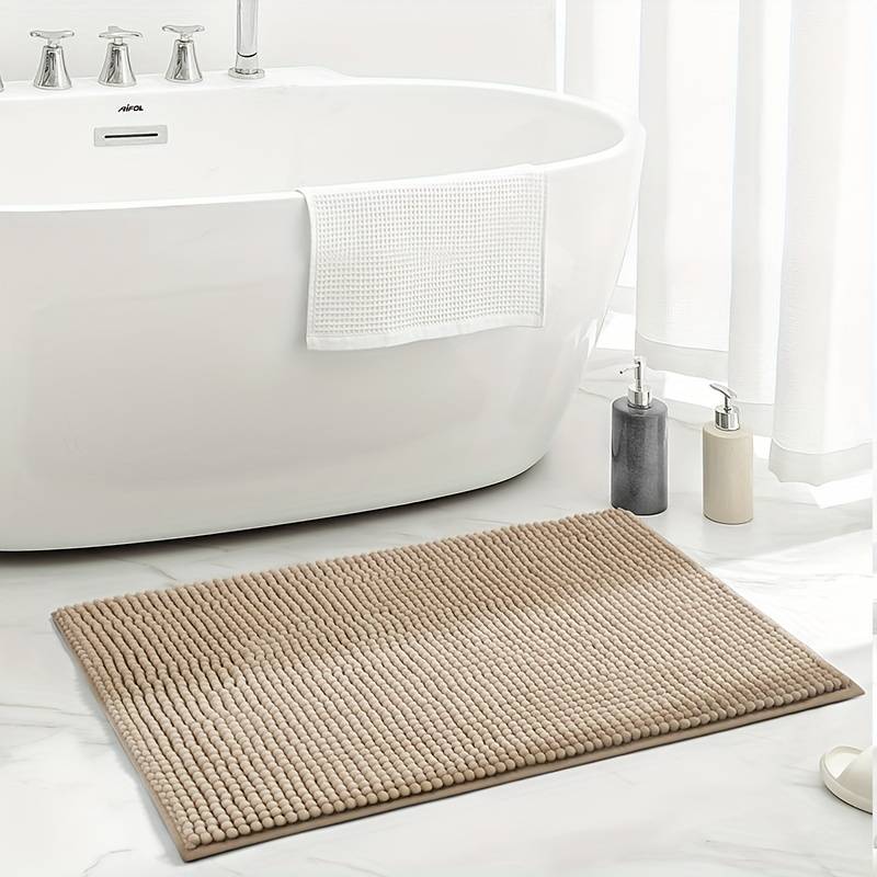 Non-slip chenille bath mat in a soft, plush texture, designed for quick-drying and superior comfort, ideal for enhancing bathroom safety and style. 4