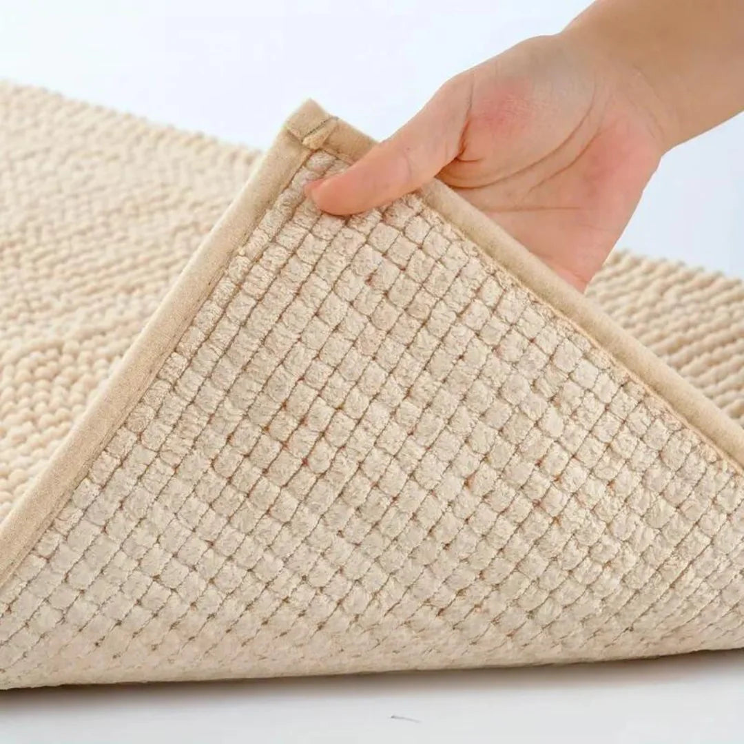 Non-slip chenille bath mat in a soft, plush texture, designed for quick-drying and superior comfort, ideal for enhancing bathroom safety and style. 5