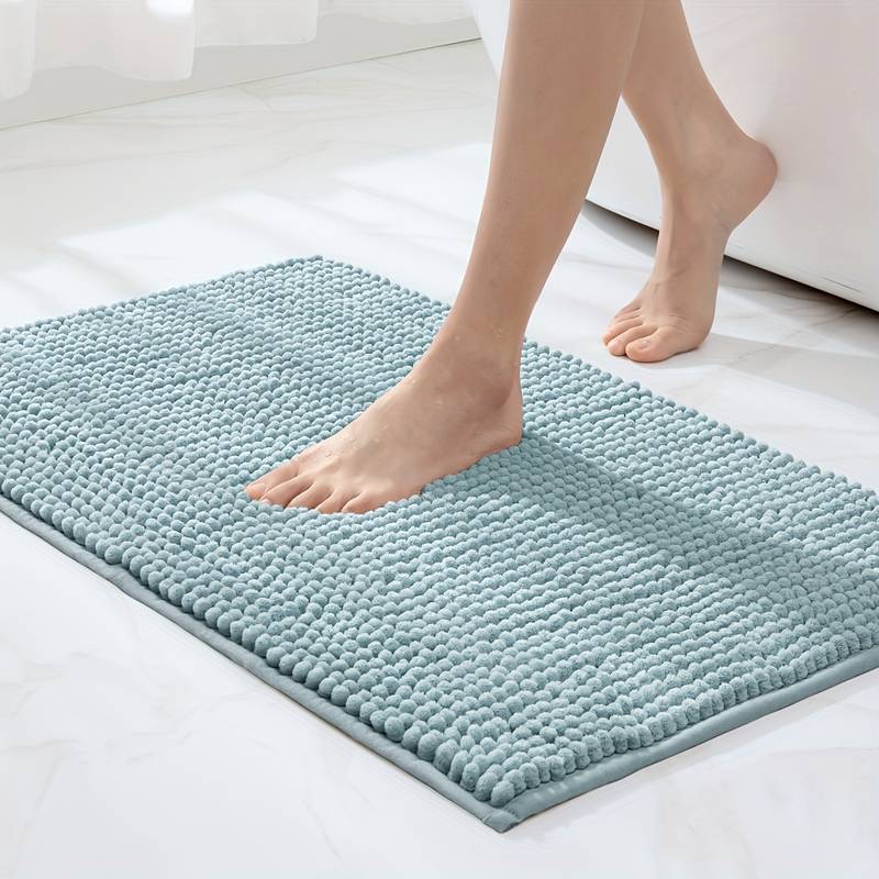 Non-slip chenille bath mat in a soft, plush texture, designed for quick-drying and superior comfort, ideal for enhancing bathroom safety and style. 7