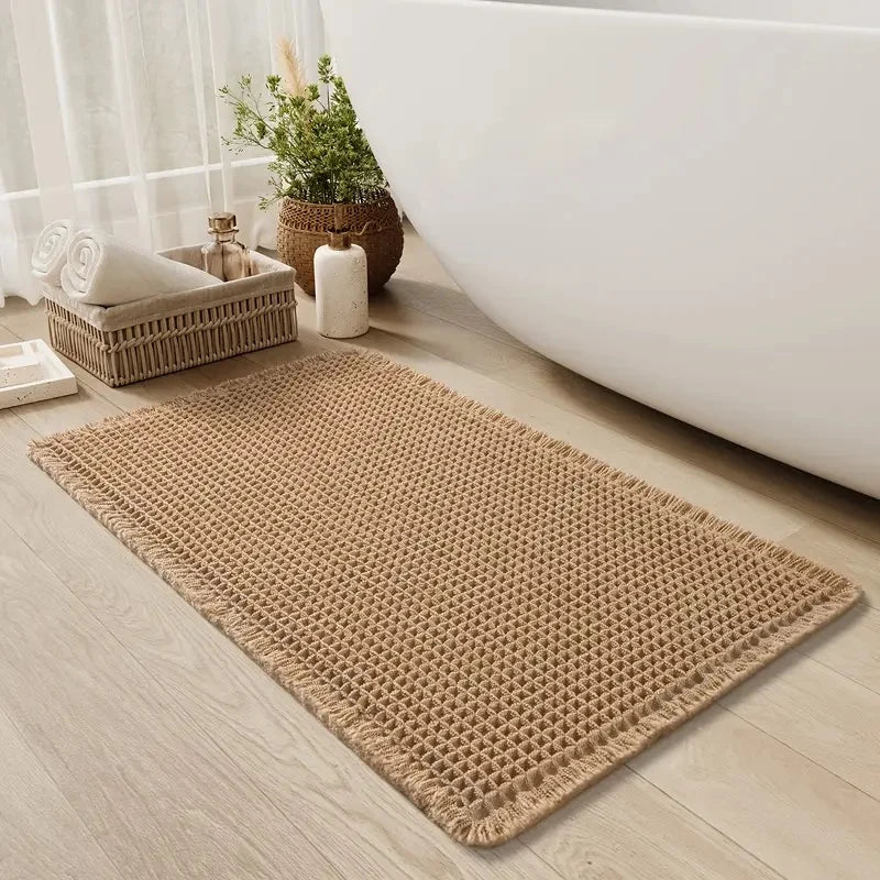 Non-slip textured waffle bath mat designed for quick-drying and enhanced safety, perfect for bathrooms and preventing slips. 0