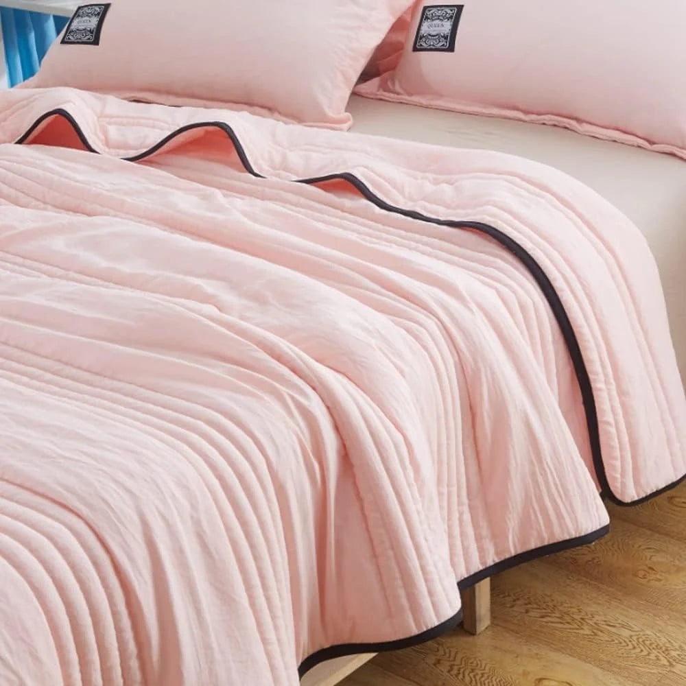 Cooling sleep blanket designed for comfort and breathability, featuring moisture-wicking fabric and a lightweight design for a restful night's sleep. 4