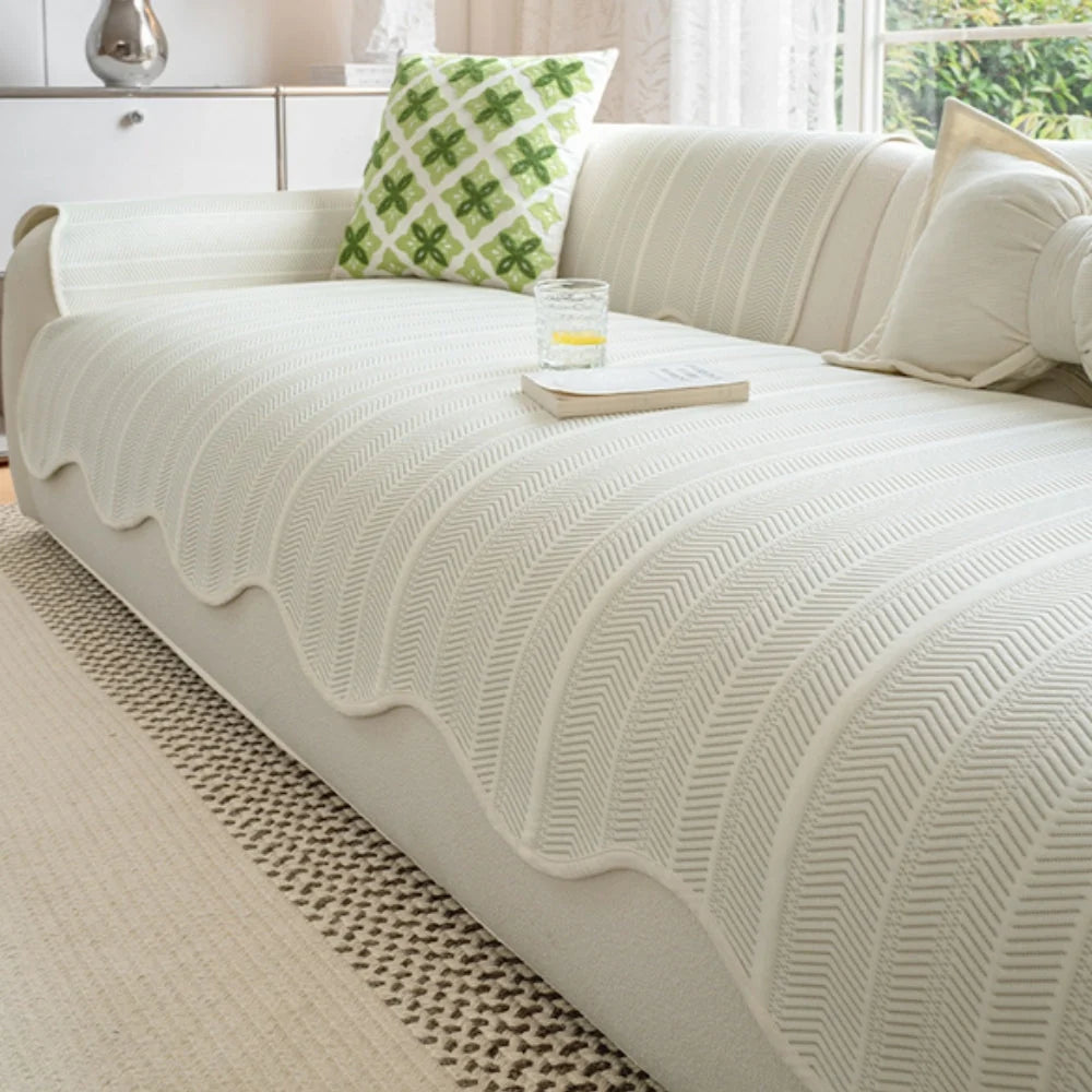 Herringbone scalloped non-slip sofa cover made of a soft microfiber blend, featuring a stylish design that provides protection and enhances the decor of your living 0