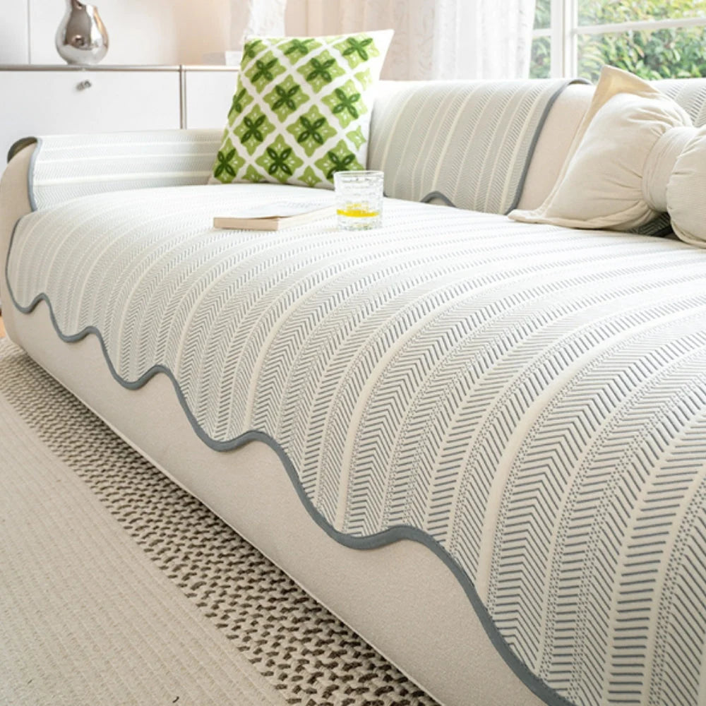 Herringbone scalloped non-slip sofa cover made of a soft microfiber blend, featuring a stylish design that provides protection and enhances the decor of your living 3