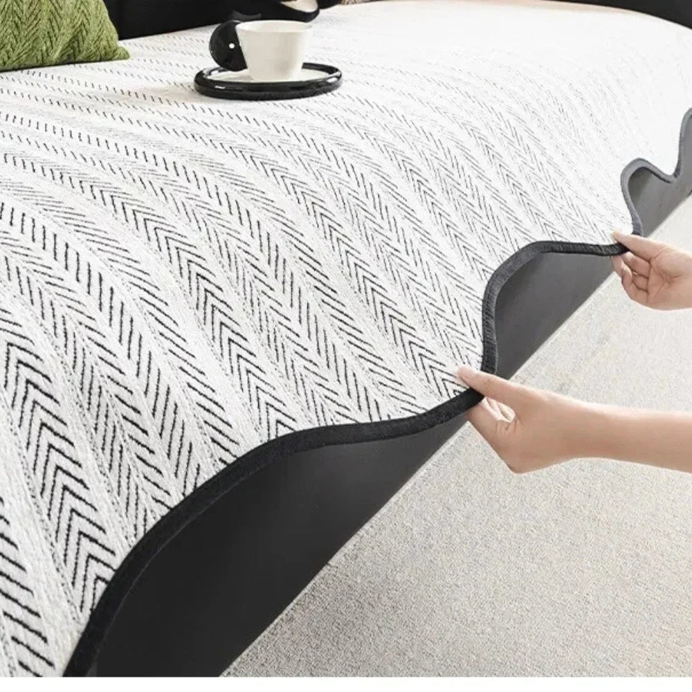 Herringbone scalloped non-slip sofa cover made of a soft microfiber blend, featuring a stylish design that provides protection and enhances the decor of your living 5