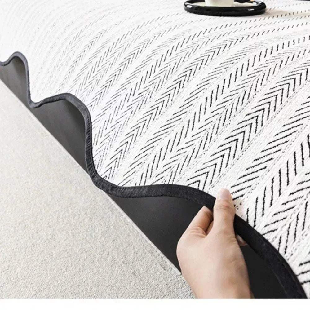 Herringbone scalloped non-slip sofa cover made of a soft microfiber blend, featuring a stylish design that provides protection and enhances the decor of your living 7