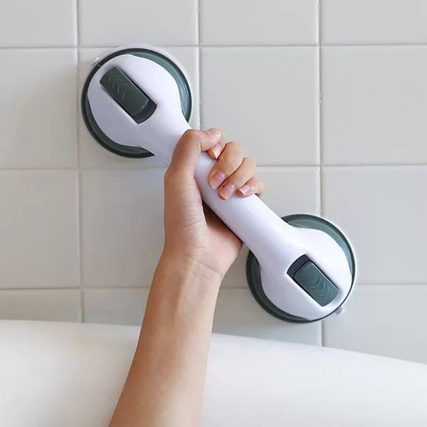 Non-slip shower handle with suction cup mounting for enhanced safety and stability in the bathroom. 0