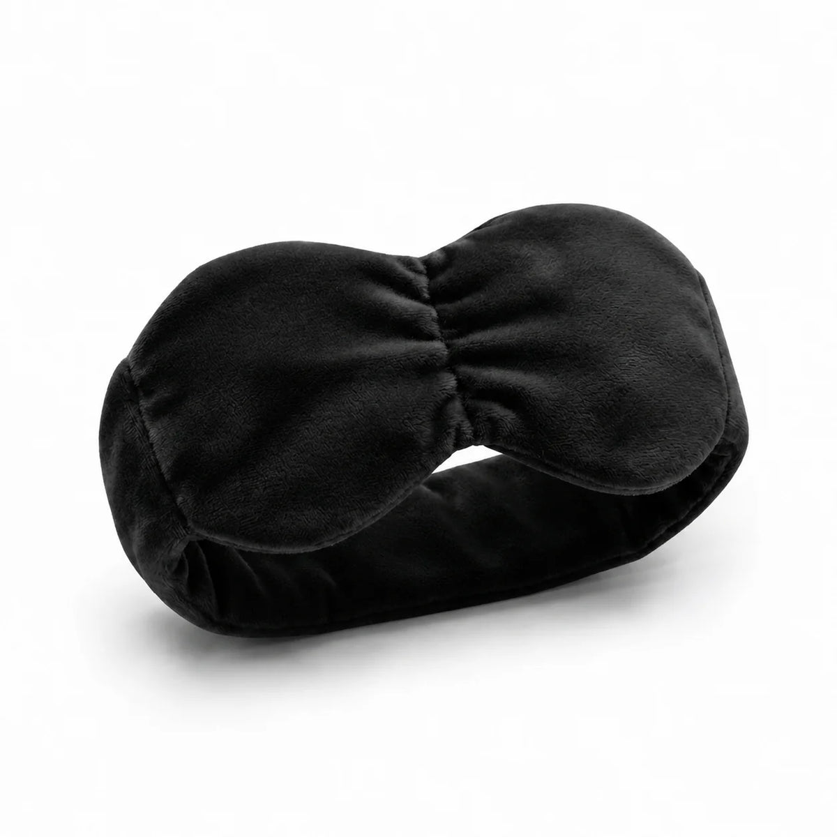 Weighted sleep mask with adjustable strap, featuring a light-blocking design for optimal rest during travel, ideal for sleep and meditation. 3