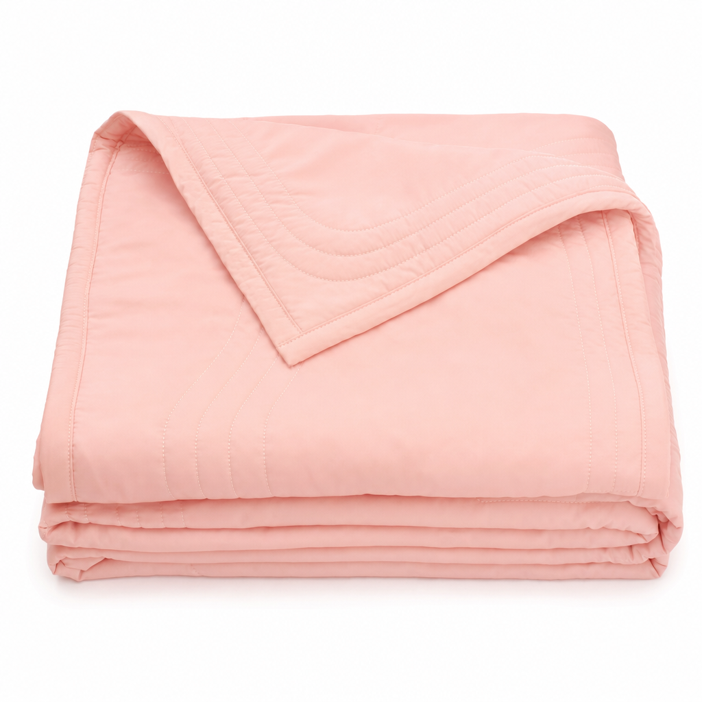 Cellvue cooling moisture-wicking blanket in Pink, folded on a white background