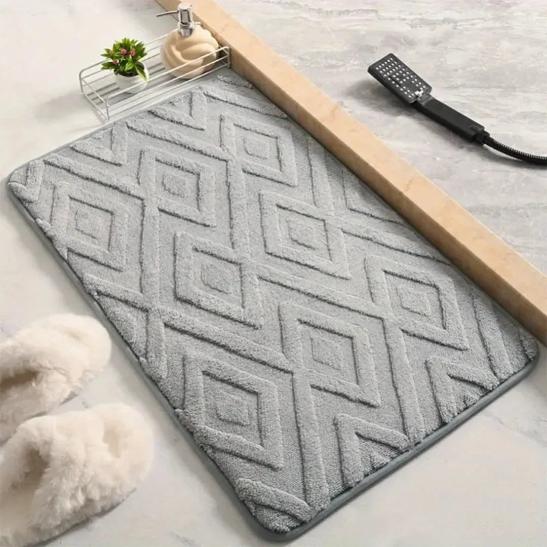 Non-slip absorbent microfibre jacquard bath mat in a stylish design, ideal for enhancing bathroom safety and comfort. 1