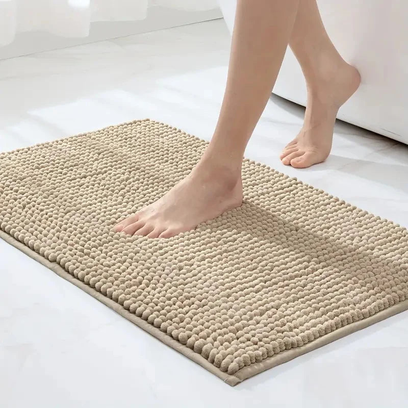 Non-slip chenille bath mat in a soft, plush texture, designed for quick-drying and superior comfort, ideal for enhancing bathroom safety and style. 6