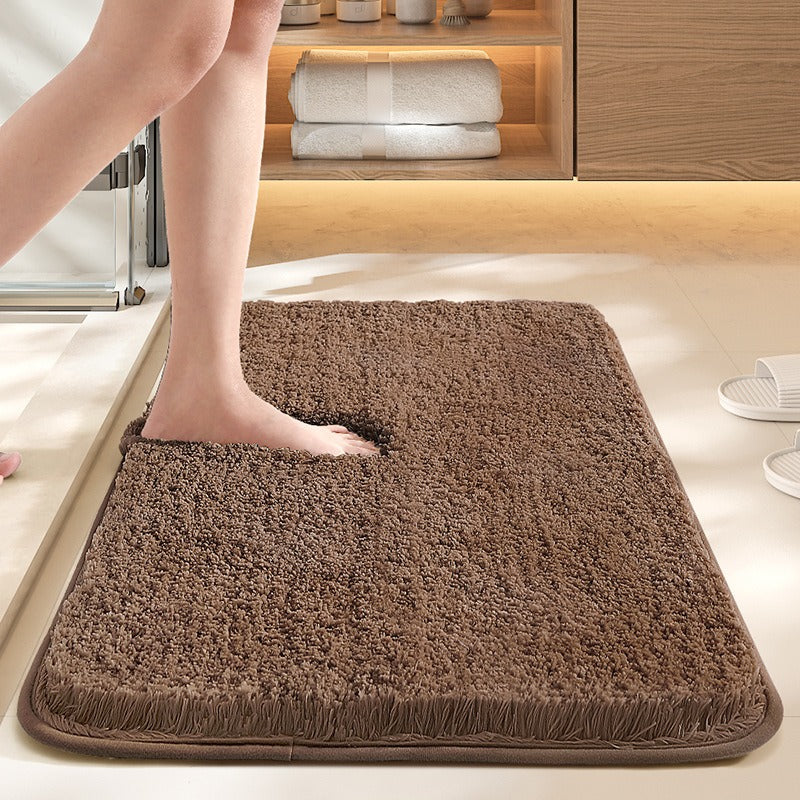 Non-slip thickened bathroom mat designed for water absorption, featuring a soft texture and durable construction for enhanced comfort and safety. 7