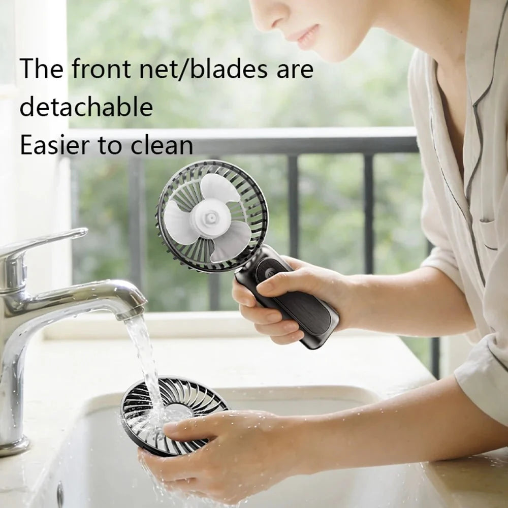 Compact USB rechargeable portable handheld fan in vibrant colors, featuring a sleek design and ergonomic handle for easy grip, ideal for on-the-go cooling and comfort during 8