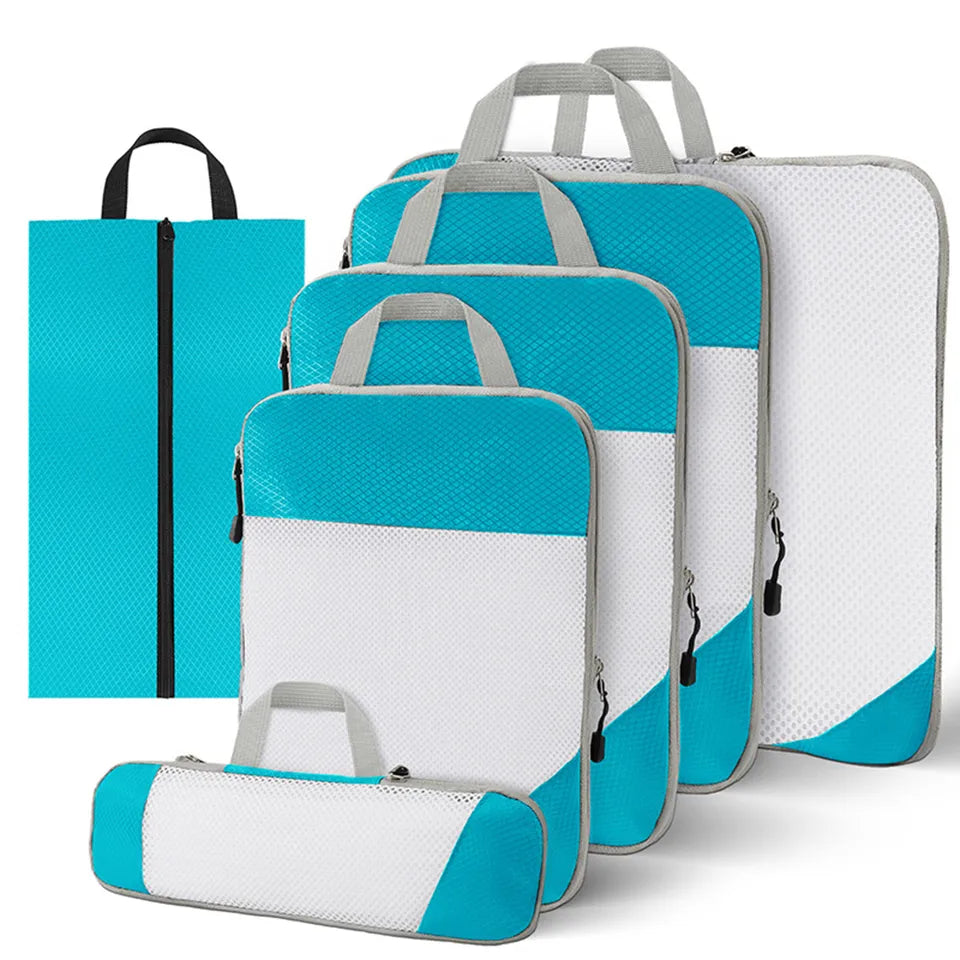 Set of 6 compression packing cubes for travel, featuring durable material and zippered compartments, designed to maximize luggage space and organize clothing efficiently. 0