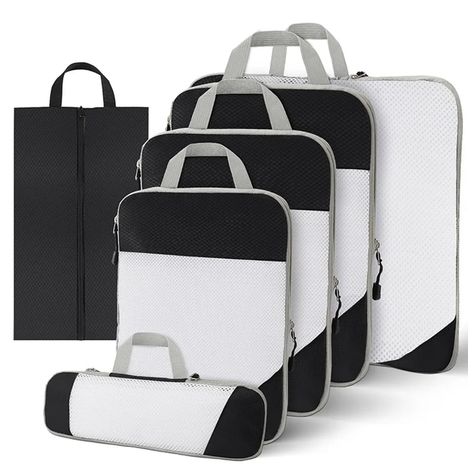 Set of 6 compression packing cubes for travel, featuring durable material and zippered compartments, designed to maximize luggage space and organize clothing efficiently. 9