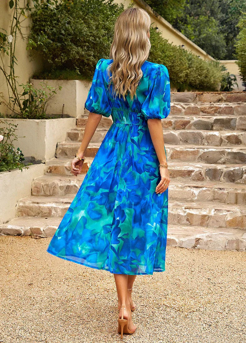 Elegant Flowing Midi Dress With Floral Print