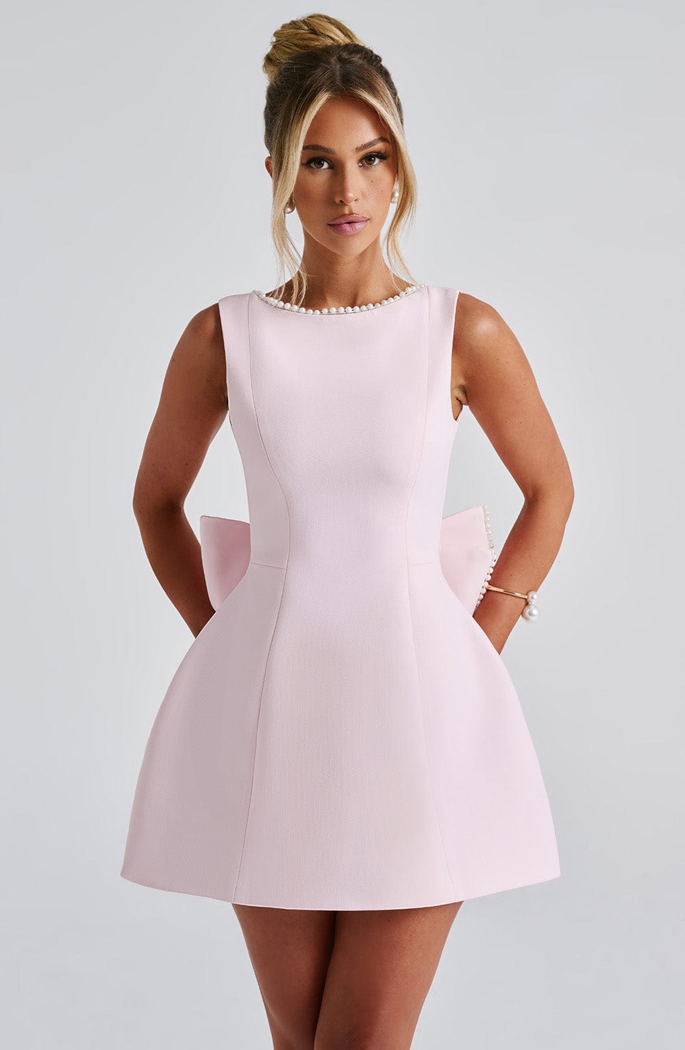 Pink Mini Dress With Pearl Neckline And Back Bow