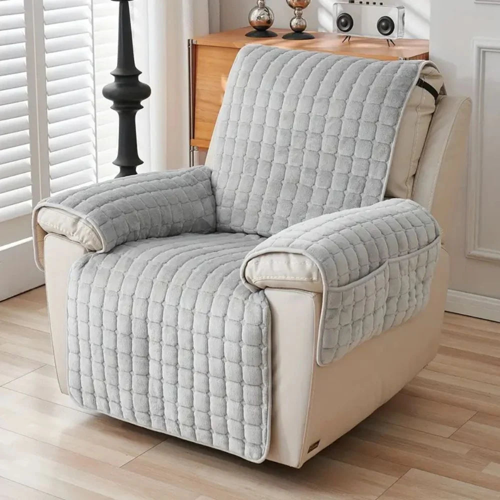 Quilted non-slip recliner chair cover in a stylish design, featuring a convenient side pocket for storage, ideal for protecting and enhancing your furniture. 0