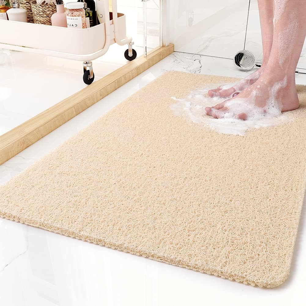 Non-slip antimicrobial shower mat with soft texture and drainage holes for optimal water flow, promoting safety and hygiene in bathrooms. 3
