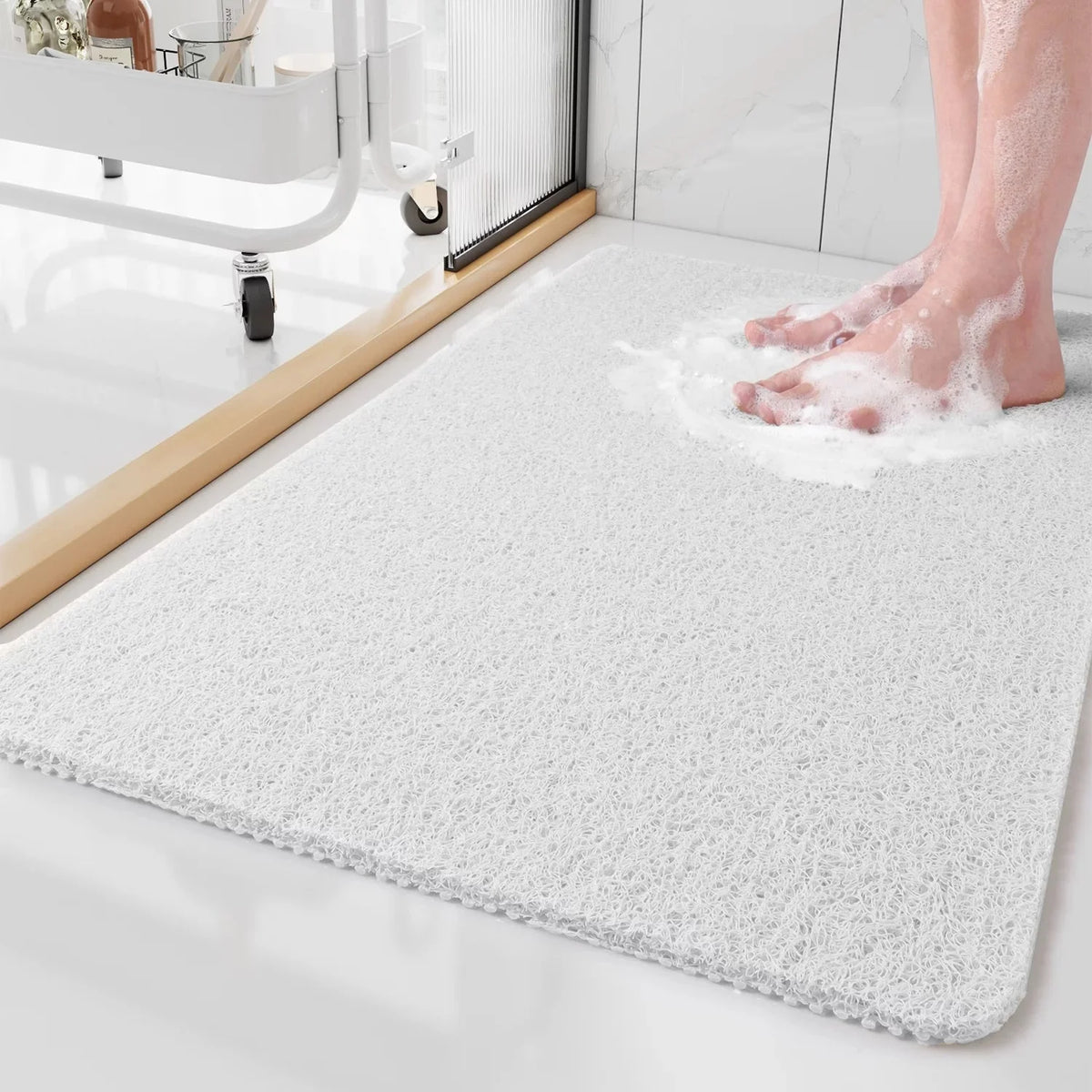 Non-slip antimicrobial shower mat with soft texture and drainage holes for optimal water flow, promoting safety and hygiene in bathrooms. 6