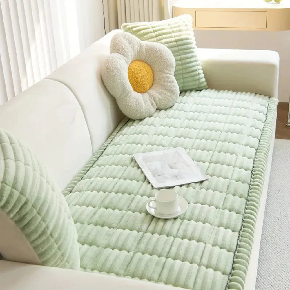 Thick flannel sofa cover featuring anti-slip pleated edges, designed for added comfort and protection while enhancing your living room decor. 1